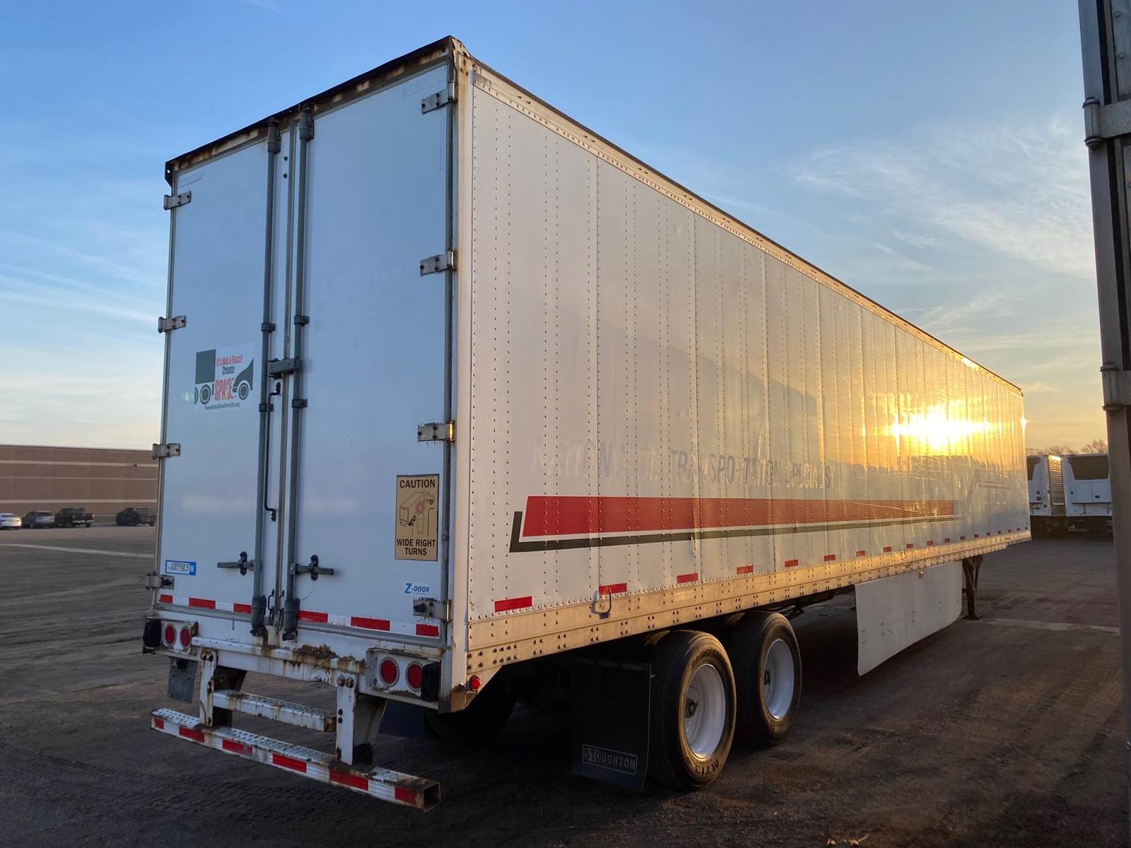 2013 Stoughton 53 ft Dry Van Trailer - Air Ride Tandem Sliding Axle