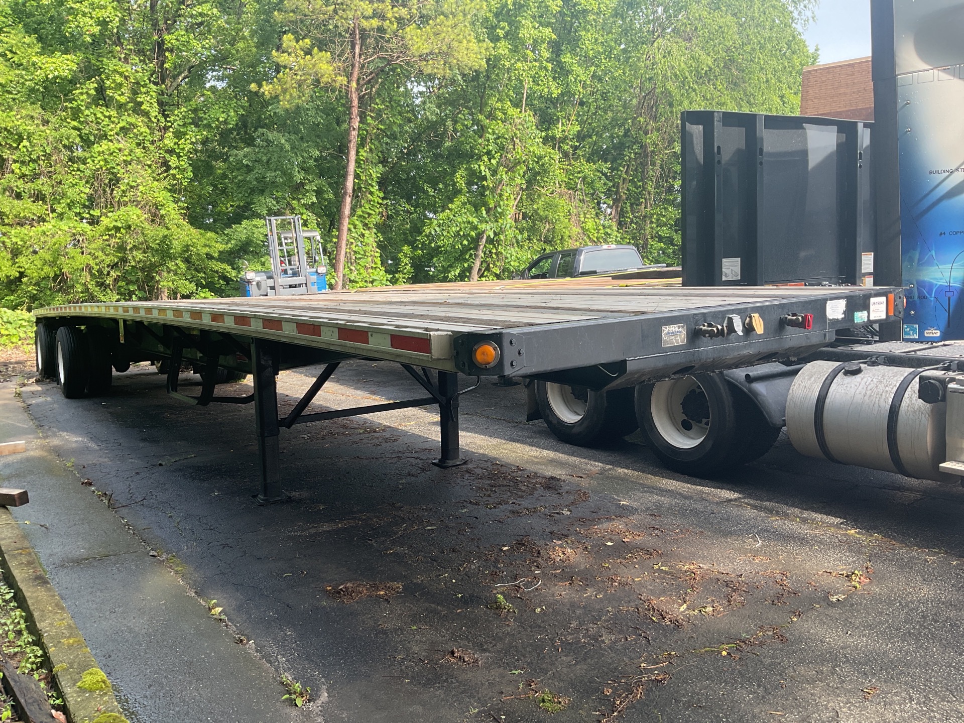 2014 Fontaine HCICF12WSA 48 ft T/A Spread Axle Flatbed Trailer