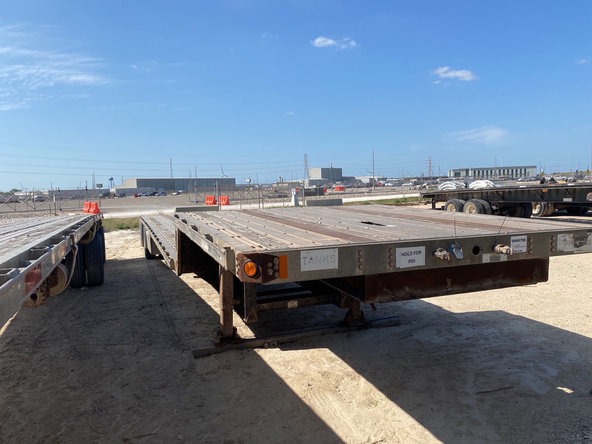 2007 Transcraft 1DFT-7-8048WSAWK 48 ft T/A Single Drop Step Deck Trailer